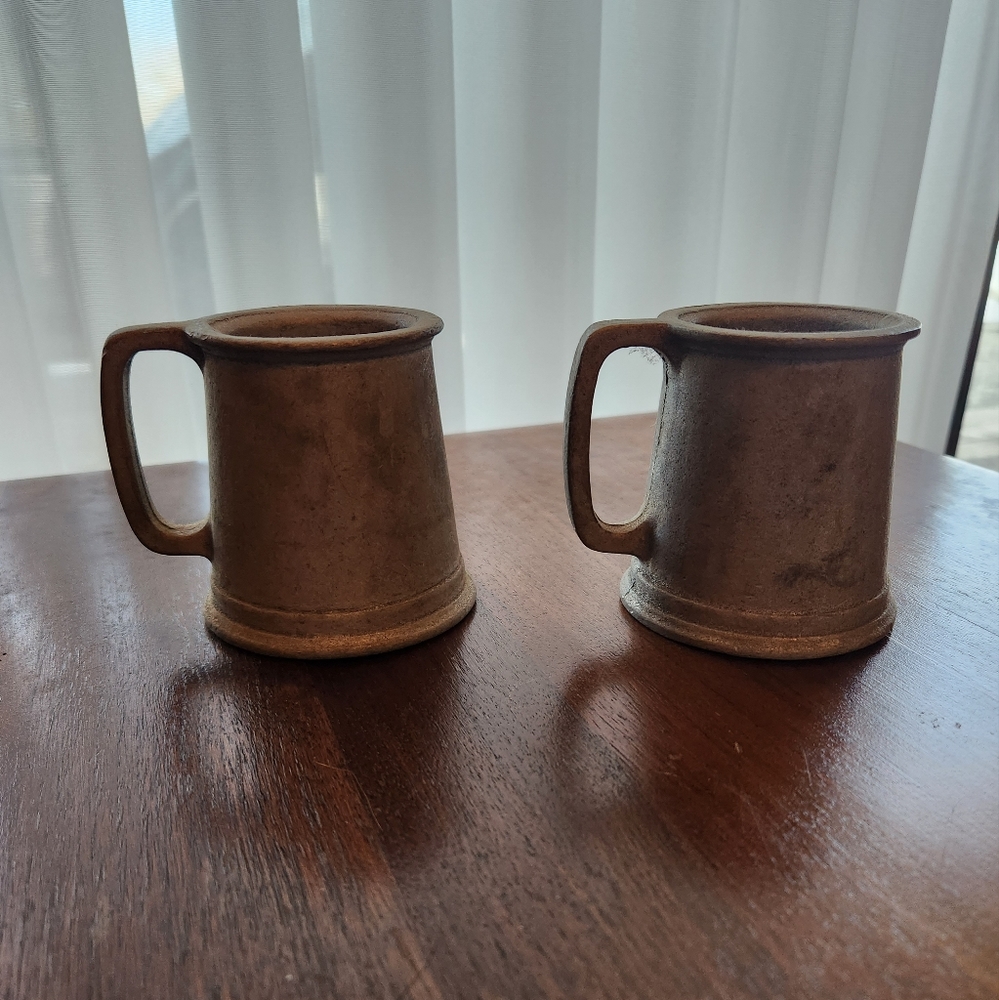 One pair of pewter mugs